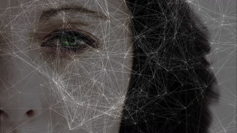 Digital Network Overlay on Female Eye - Biometric Technology Concept
