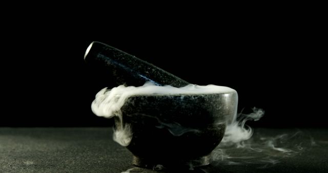 A mortar and pestle emits a mysterious smoke against a dark background, with copy space. The image evokes a sense of ancient alchemy or modern culinary preparation.