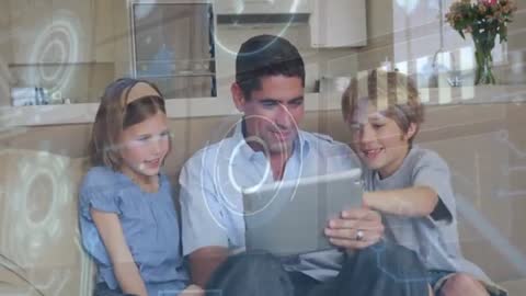 Father and Children Engaging with Digital Tablet Together at Home