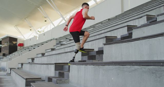 Caucasian disabled male athlete with prosthetic leg training, running up stairs - Download Free Stock Photos Pikwizard.com