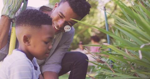Father and Son Bonding During Gardening Activity