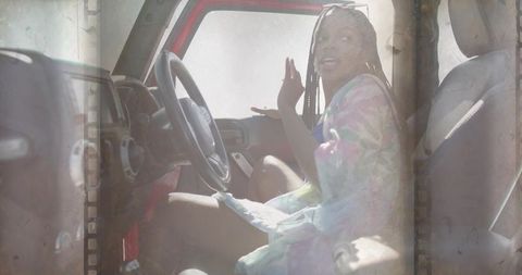 Stylish Woman Enjoying Crossover Adventure in Bright Jeep