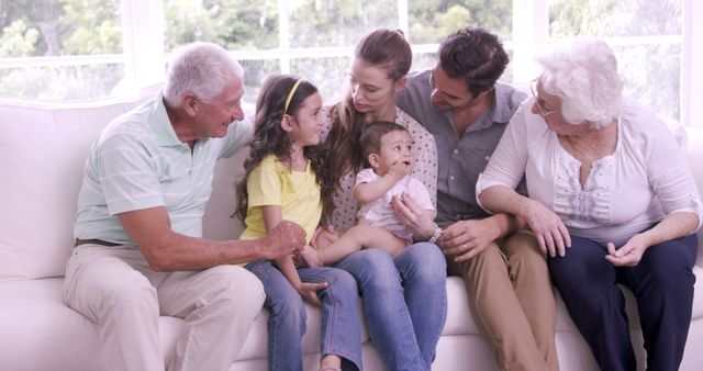 Multi-Generational Family Bonding on Living Room Sofa - Download Free Stock Images Pikwizard.com