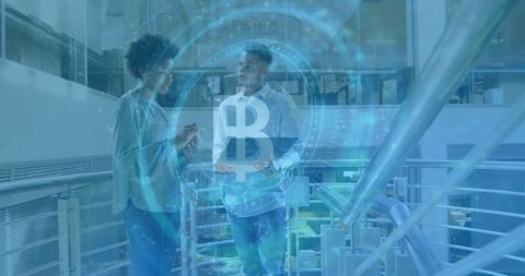 Modern colleagues discussing bitcoin in futuristic office atrium