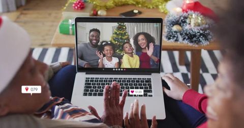 Family video call during christmas holiday celebration at home