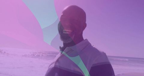 Relaxed Mature Man Enjoying Beach with Purple Overlay