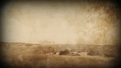 Camera panning right revealing sepia farm cluster in rolling fields, vintage grain