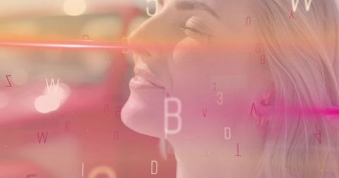 Woman immersed in a futuristic digital paradigm with letters