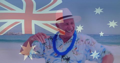 Elderly man in tropical shirt enjoying beach with superimposed australian flag