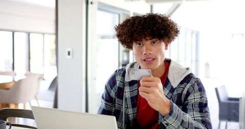 Young Man Shopping Online with Credit Card in Home Office - Download Free Stock Images Pikwizard.com