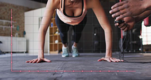 Close-up of Woman Doing Push-Ups with Trainer Timing - Download Free Stock Images Pikwizard.com