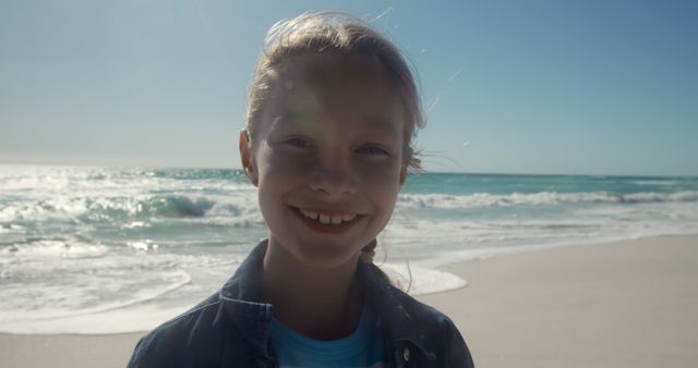 Smiling Child Enjoying Sunny Beach Day - Download Free Stock Images Pikwizard.com