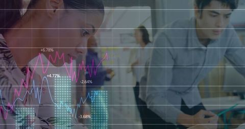 Engineers Analyzing Financial Data and Statistics in Modern Office