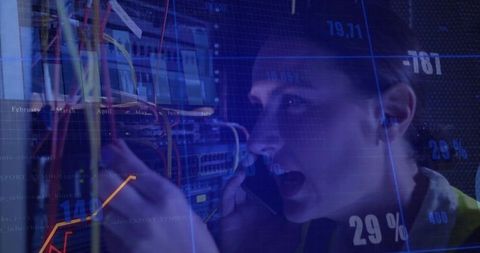 It technician monitoring network in digital data center environment