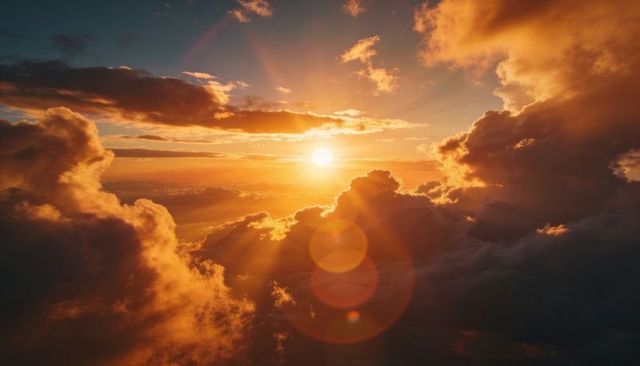 Golden Sunrise Above Dramatic Cloudscape with Crepuscular Rays and Lens Flare
