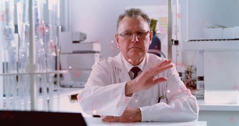 Senior scientist conducting laboratory experiment research