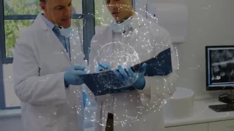 Senior and Junior Doctors Collaborating with Holographic Globe Technology