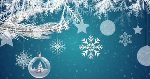 Snow Falling on Hanging Christmas Decorations with Blue Background - Download Free Stock Images Pikwizard.com