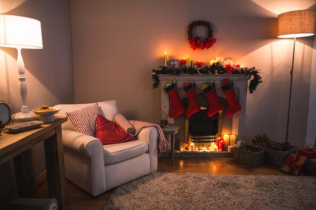 Living room featuring a decorated fireplace with Christmas stockings, candles, and garlands. Ideal for holiday-themed promotions, home decor inspiration, and festive greeting cards.