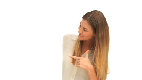 Smiling Woman Pointing at Blank Space Highlighting Concepts