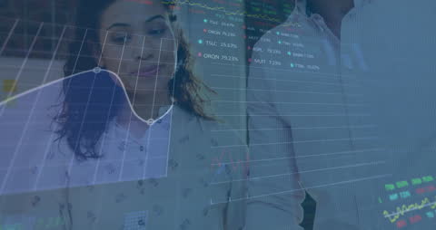 Business Professionals Analyzing Stock Market Data Graphs