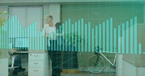 Professional Examining Financial Graph in Modern Office Environment