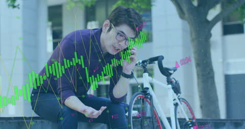 Businessman Analyzing Stocks on Smartphone in Urban Setting