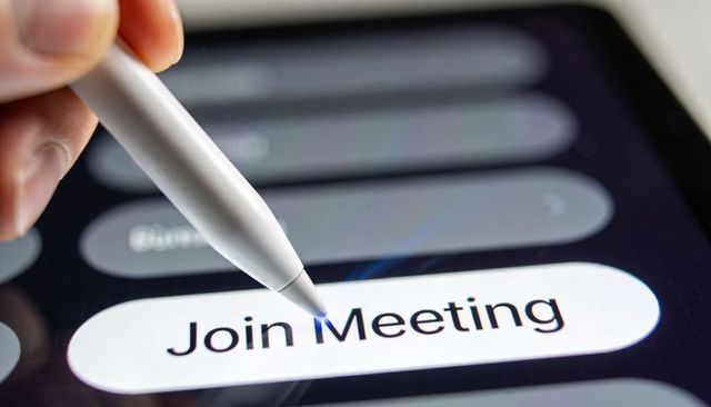 Tapping stylus joining virtual meeting on tablet screen for remote work collaboration