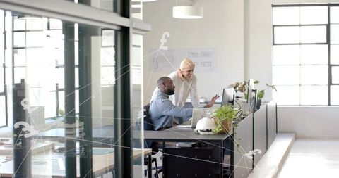 Innovative Finance Analysis in Modern Open Office Workspace