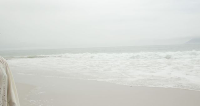 Empty Beach with Soft Waves on Cloudy Day - Download Free Stock Images Pikwizard.com