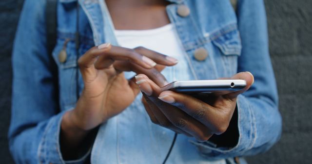 Closeup of Person Texting on Smartphone Outdoors in Denim Jacket - Download Free Stock Images Pikwizard.com