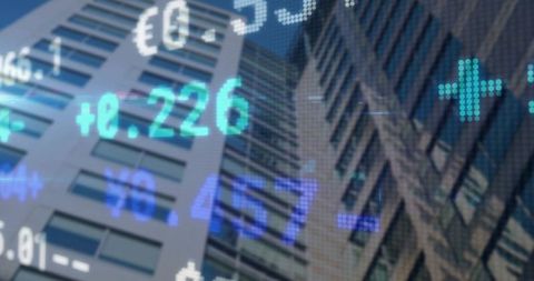 Futuristic Finance Overlay on City Skyscrapers