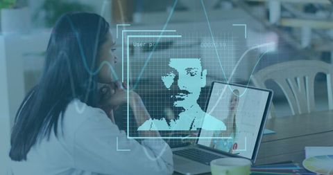 Businesswoman on virtual call analyzing real-time data holograph