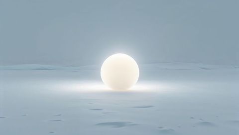 Glowing White Sphere on Vast Plain Under Overcast Sky