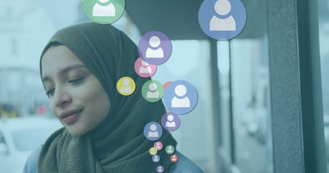 Smiling Woman in Hijab with Social Media Icons in Urban Setting