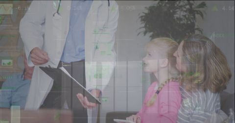 Doctor Discussing Diagnosis with Family in Medical Setting