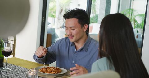 Happy Couple Enjoying Spaghetti Dinner Together - Download Free Stock Images Pikwizard.com