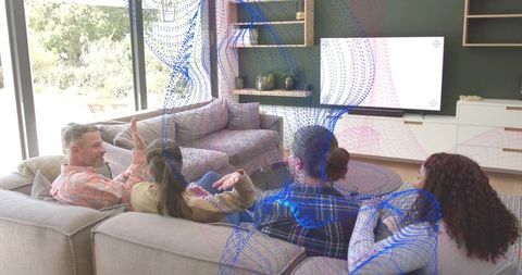 Family watching tv on modern sectional sofa relaxing in cozy daylight living room