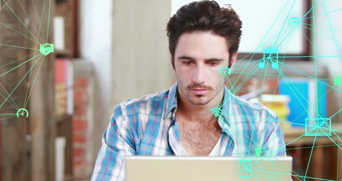 Man Working on Laptop with Interconnected Digital Network Overlay
