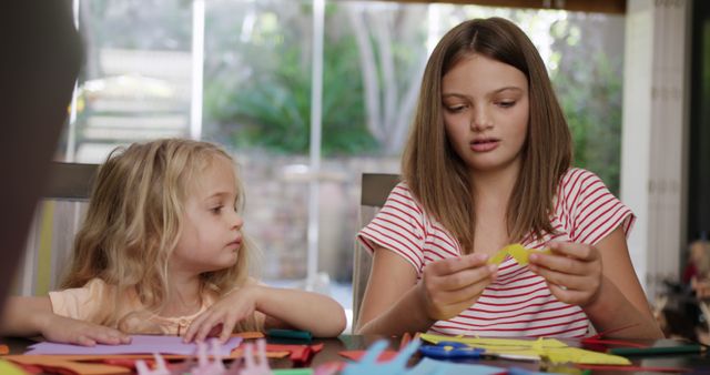 Two Sisters Engaging in Arts and Crafts at Home - Download Free Stock Images Pikwizard.com