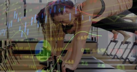 Women practicing reformer pilates in group class with market charts overlay showing metrics