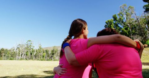 Back View of Women Embracing in Tranquil Park Setting - Download Free Stock Images Pikwizard.com