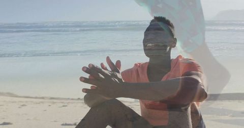 Man Enjoying Tranquil Beach Vibes with Overlapping Surf