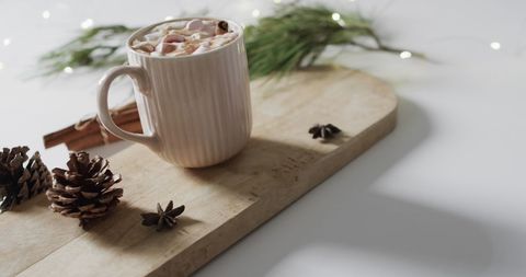Cozy Winter Hot Chocolate with Pine Cones and Festive Spice - Download Free Stock Images Pikwizard.com