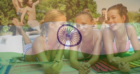 Friends relaxing by pool taking selfie with indian flag overlay celebrating summer fun