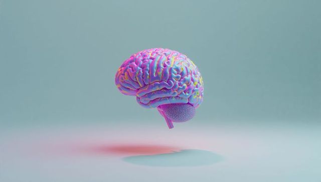 Futuristic styled brain model floating in pastel colored studio