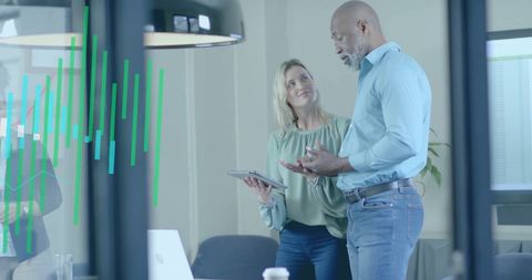 Diverse Team in Office Discussing Financial Data Integration