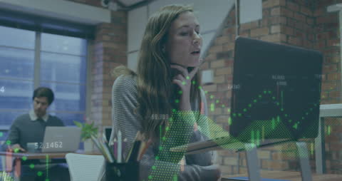 Caucasian Businesswoman Analyzing Data on Laptop in Office