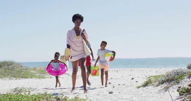 Mother with Children Enjoying Day at Beach - Download Free Stock Images Pikwizard.com