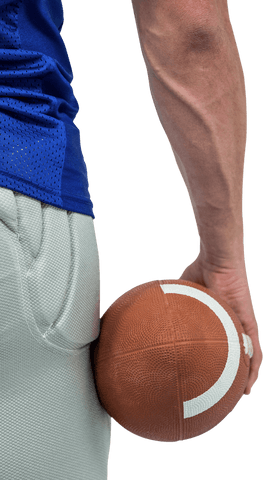 Close-up transparent focus on football in hand by player